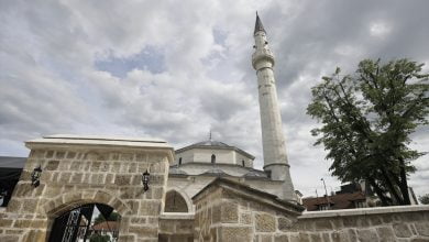 Community gathering at the Arnaudija Mosque reopening in Banja Luka, showcasing the restored architecture and vibrant cultural celebration