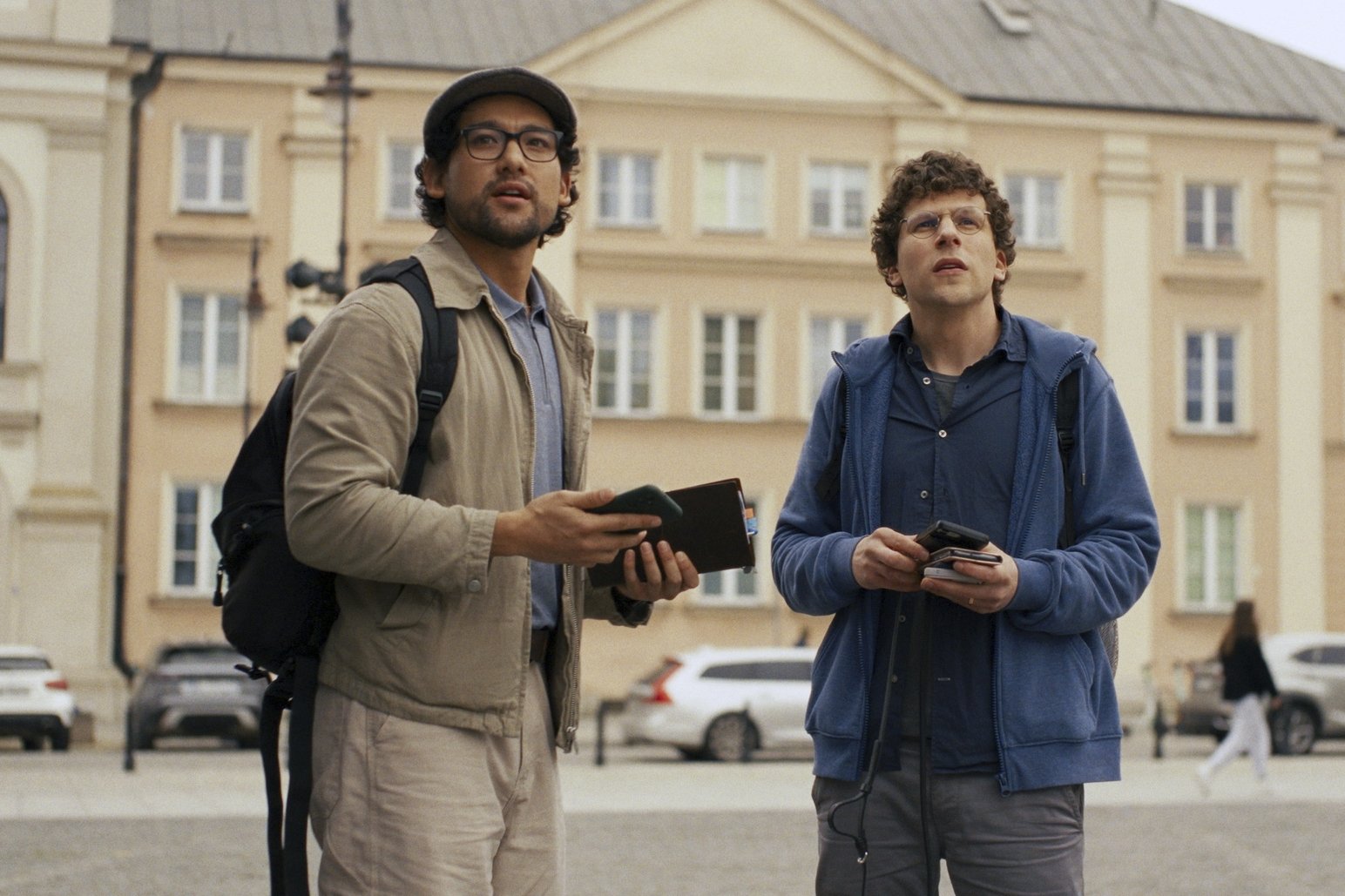 This image released by Searchlight Pictures shows Will Sharpe, left, and Jesse Eisenberg in a scene from 