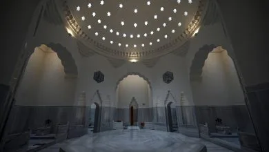 Historical Ottoman hammam, showcasing restored Iznik tiles and traditional architecture.