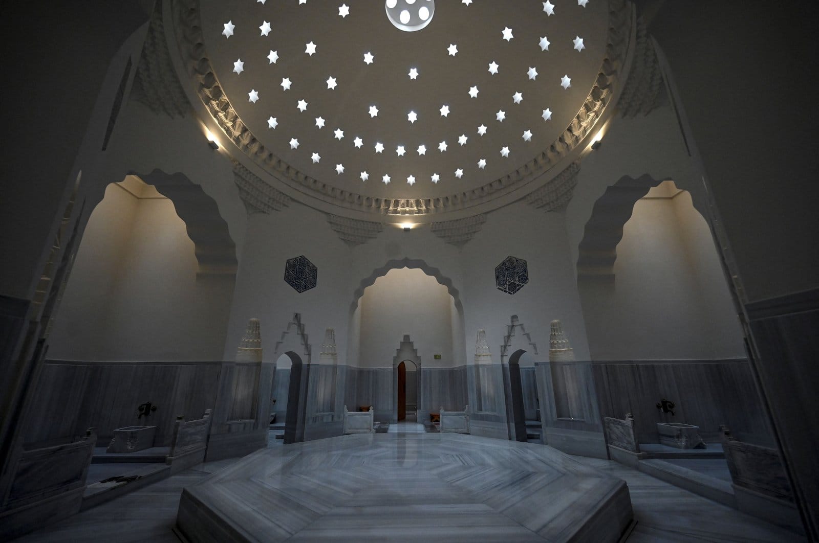 Historical Ottoman hammam, showcasing restored Iznik tiles and traditional architecture.