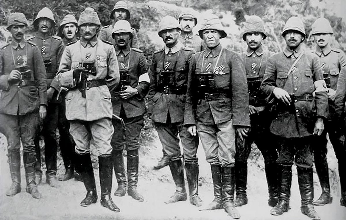 Lt. Col. Mustafa Kemal (lighter uniform at left) and his commanders on the Gallipoli Peninsula in 1915. (Photo courtesy of Wikimedia Commons)