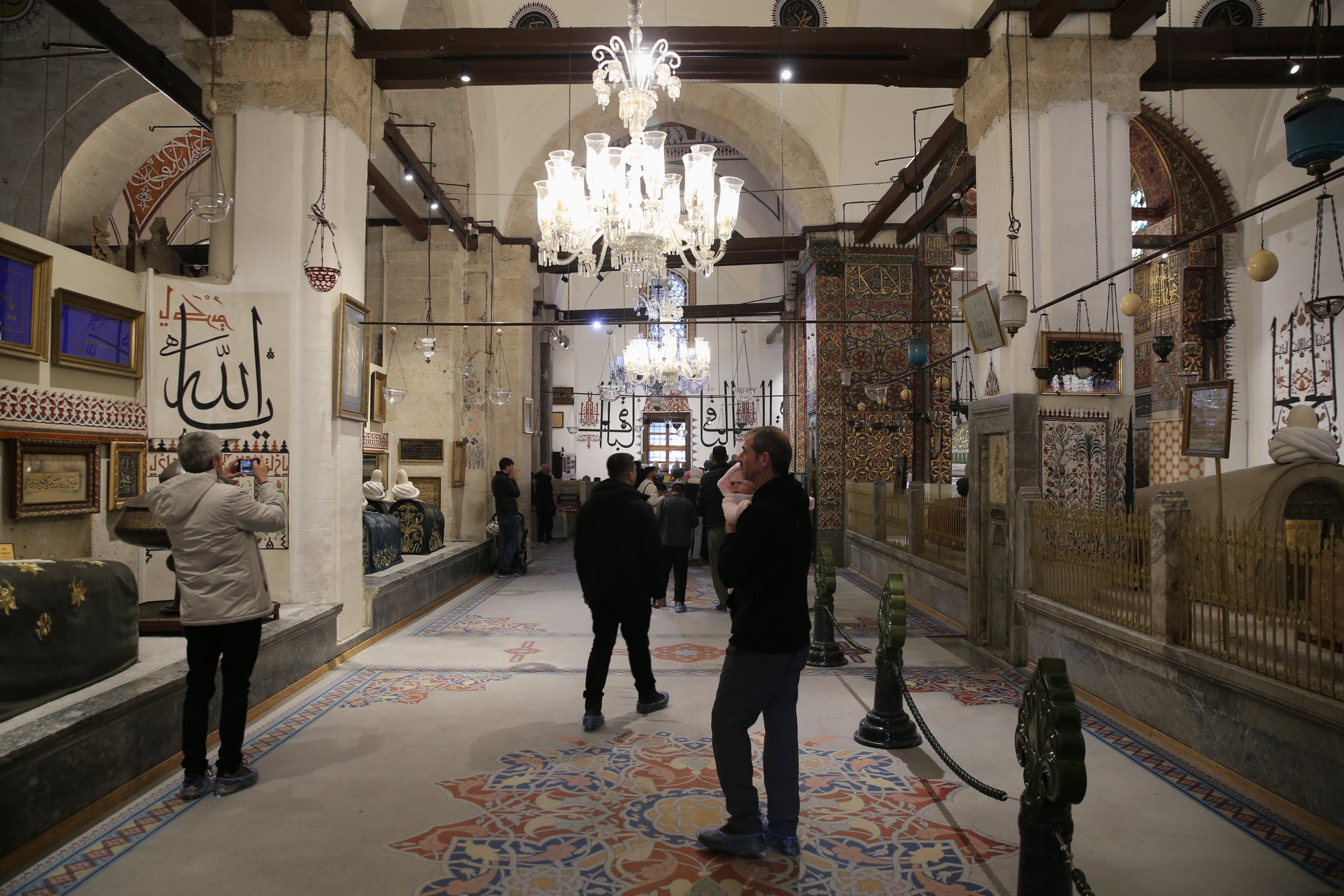 Visitors examine the Mevlana Museum Konya, central Türkiye, Jan. 3, 2025. (AA Photo)